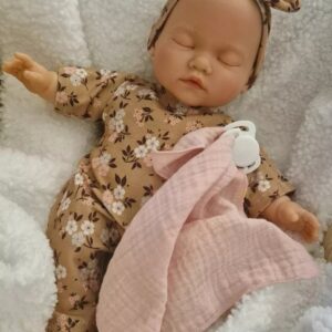 Poupon dormeur fleuri beige au corps mou