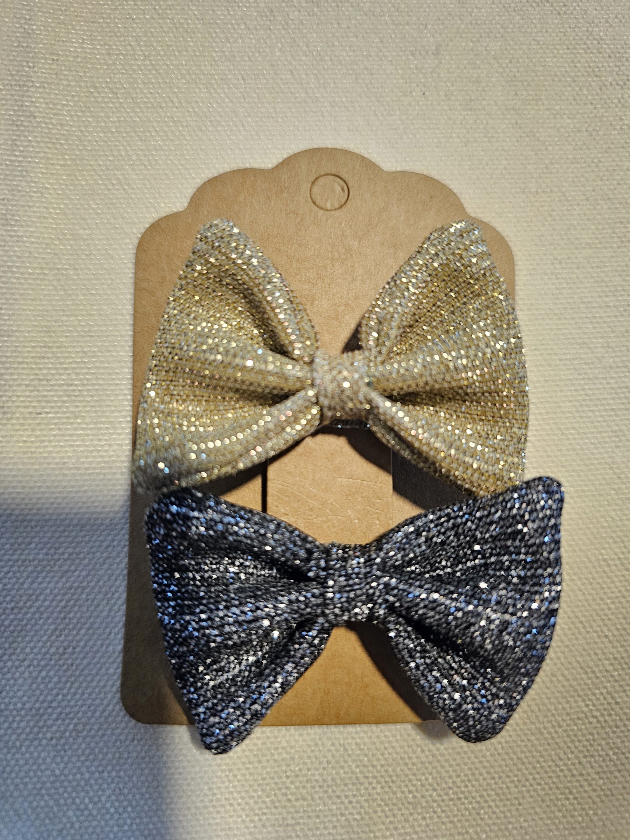 Lot de 2 mini pinces dorées et noires pailletées